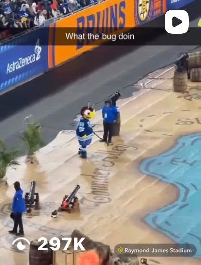 Video screenshot from the 'What the Bug Doin' campaign — ThunderBug mascot at Raymond James Stadium during a stadium event with 297K views